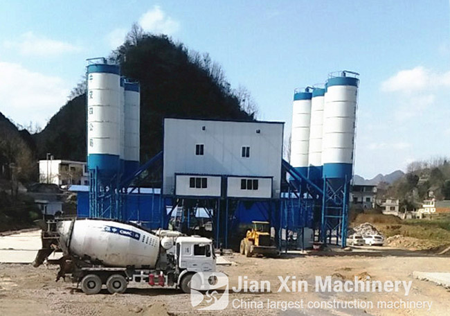  The double 120 concrete mixing plant from Zhengzhou Jianxin Machinery works at a construction site in Anshun, Guizhou, China.